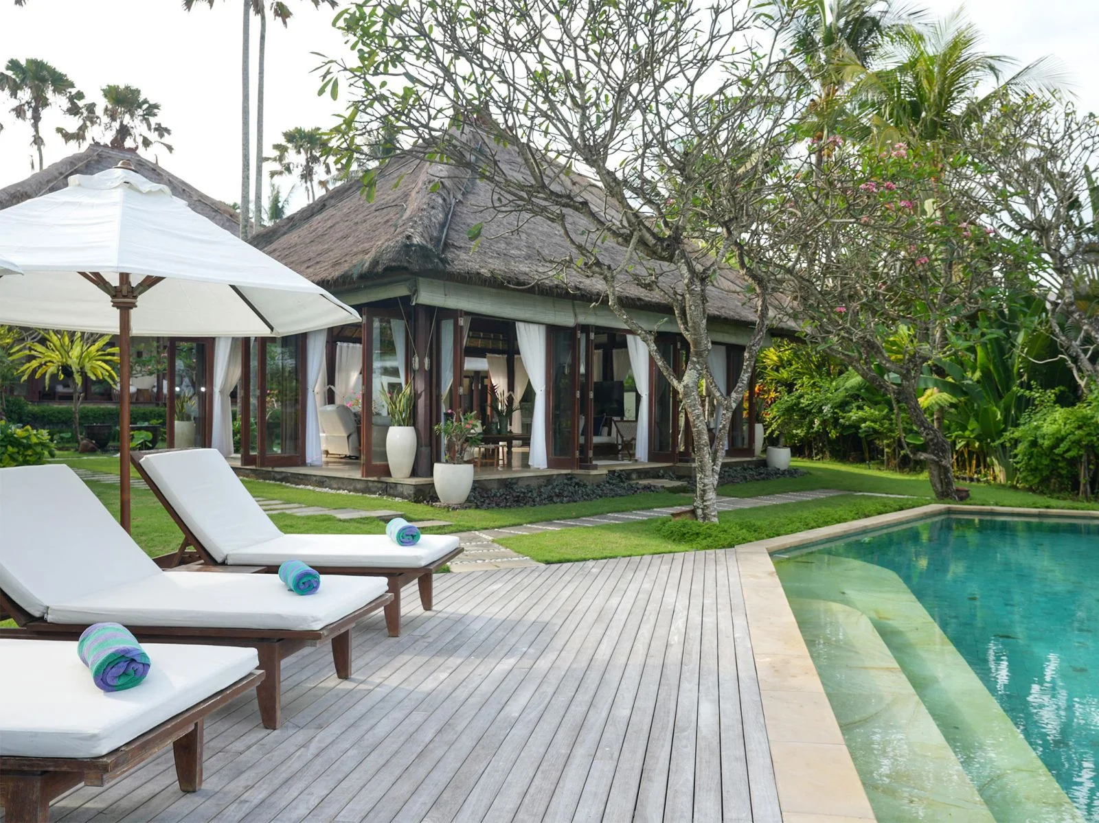 13 villa tanju inviting sunloungers by the pool